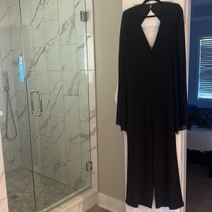 Large black jumpsuit with sheer sleeves